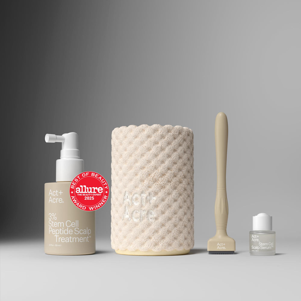 Skincare products including a bottle, a textured jar, and a brush on a gray background with an 'Allure' award badge.