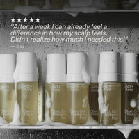 A row of Act+ Acre Stem Cell Thickening Foam bottles on a dark textured background with white foam dripping over them. A five-star review quote by Erika is printed at the top.