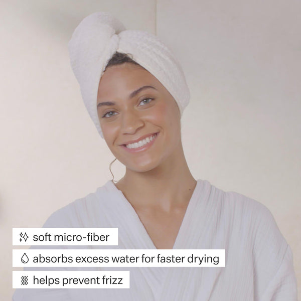 Woman using Act+Acre Hair Towel with text describing product benefits
