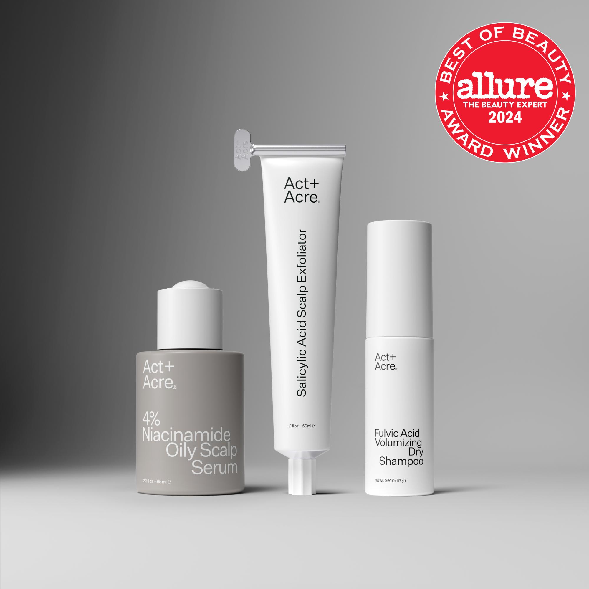 Three scalp care products with 'Allure Best of Beauty 2024' award on a gray background